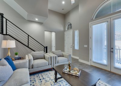 Inside image of a room with gray, white, and blue colors
